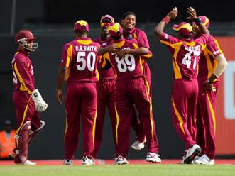 West Indies beat Australia by 14 runs, level T20 series