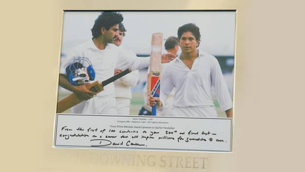 Sachin Tendulkar presented photograph of first Test ton by British Prime Minister David Cameron Sachin Tendulkar presented photograph of first Test ton by British Prime Minister David Cameron